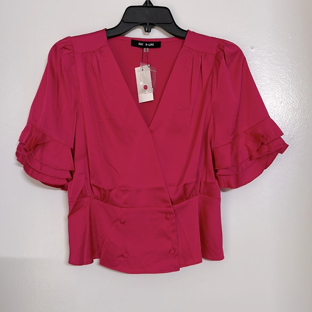 Hot pink peplum style ruffle sleeve satin blouse